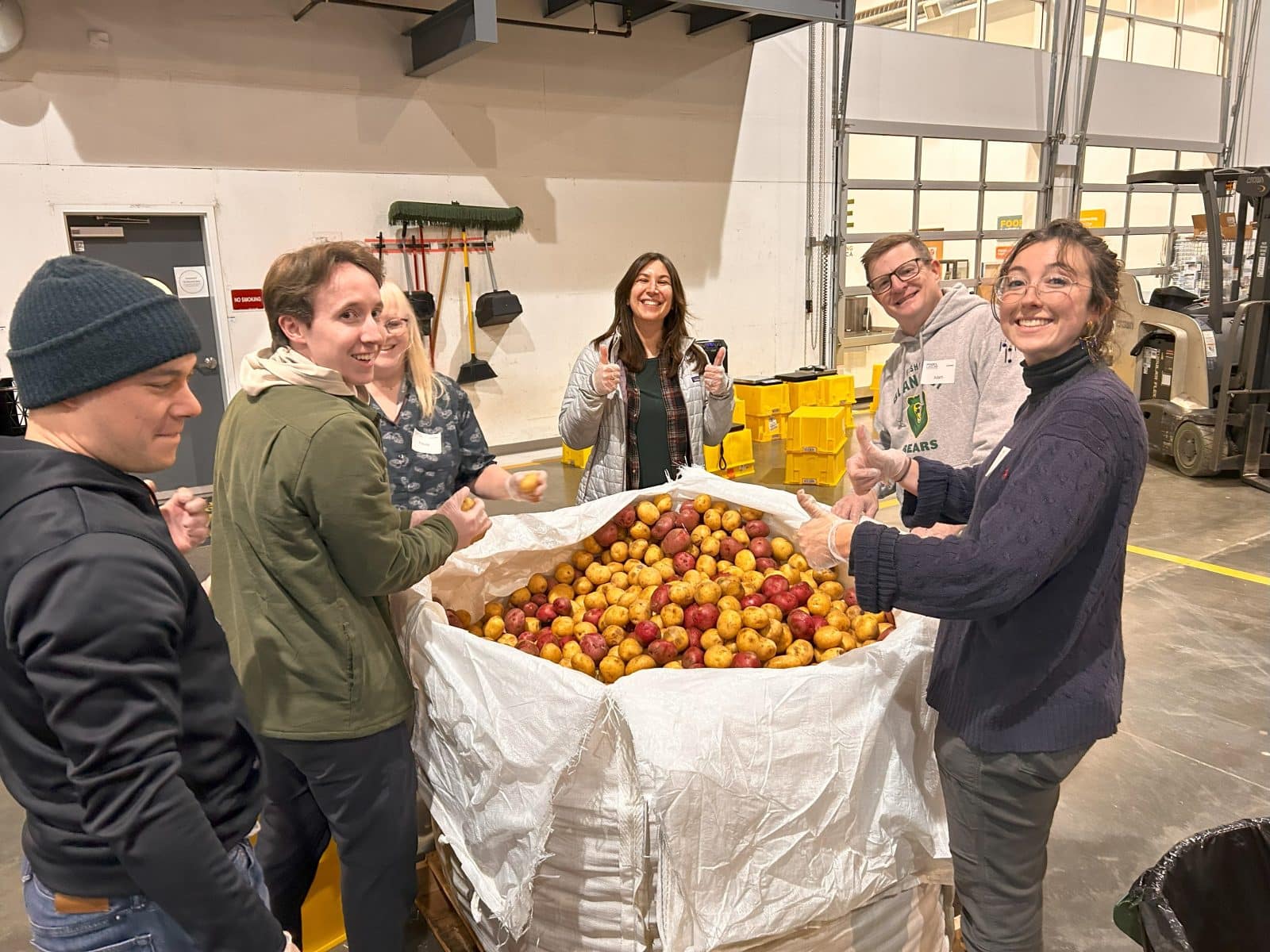 Giving back to the community by volunteering at a local food bank. 