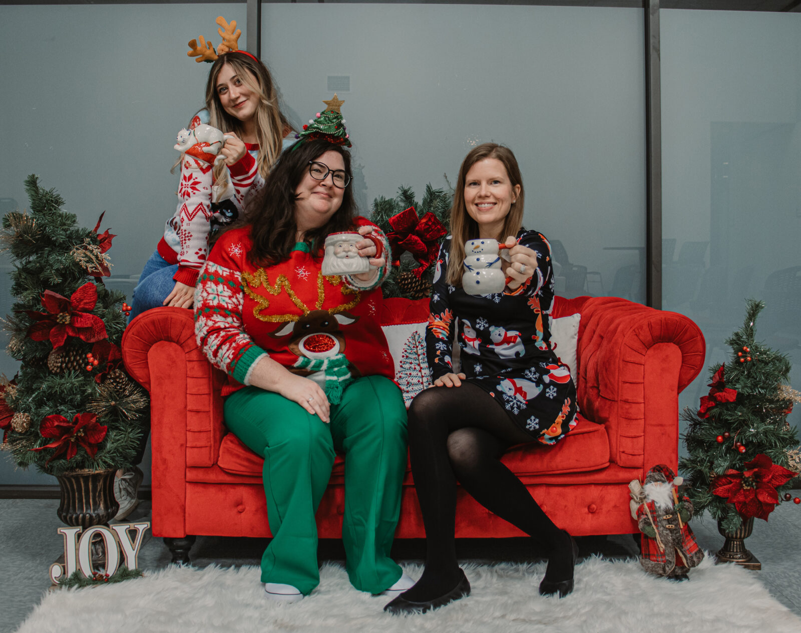 Celebrating the season together at a Consor holiday party.