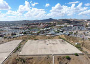 Aerial view of Sunset Reservoir, a flat, rectangular structure build into the hillside.